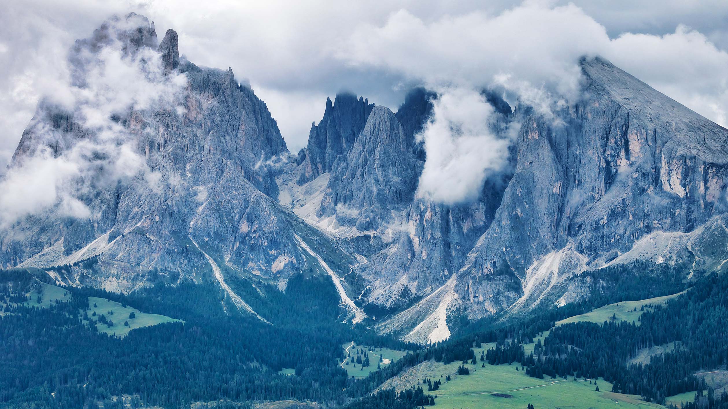 Peaks emerging from grey cloud